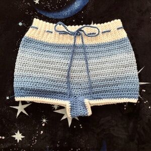 Crochet Sky Blue Shorts with White Cloud Back Pocket Appliqués.